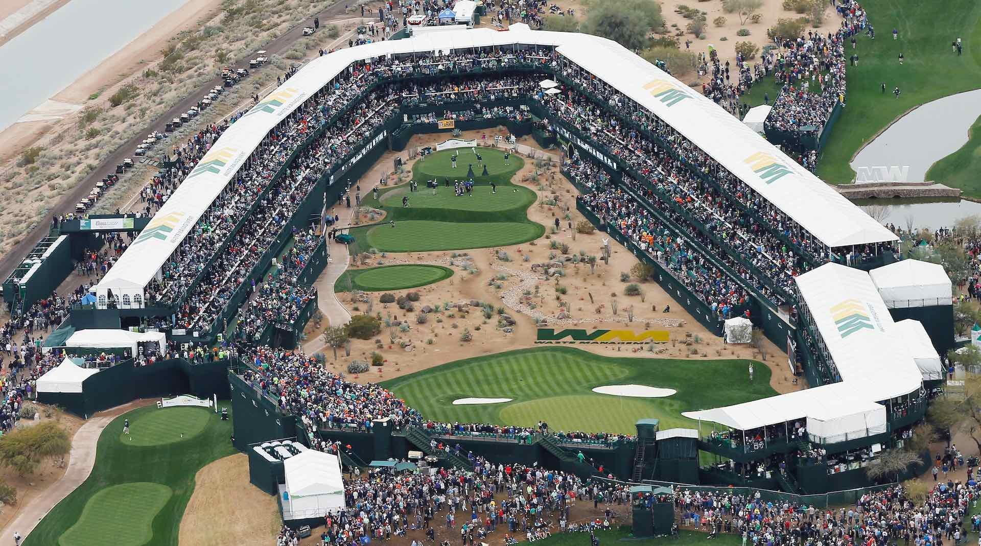 SCOTTSDALE, AZ - JANUARY 31: A large group of fans watch the play around the par-three 16th hole during the third round of the Waste Management Phoenix Open at TPC Scottsdale on January 31, 2015 in Scottsdale, Arizona. (Photo by Scott Halleran/Getty Images)
