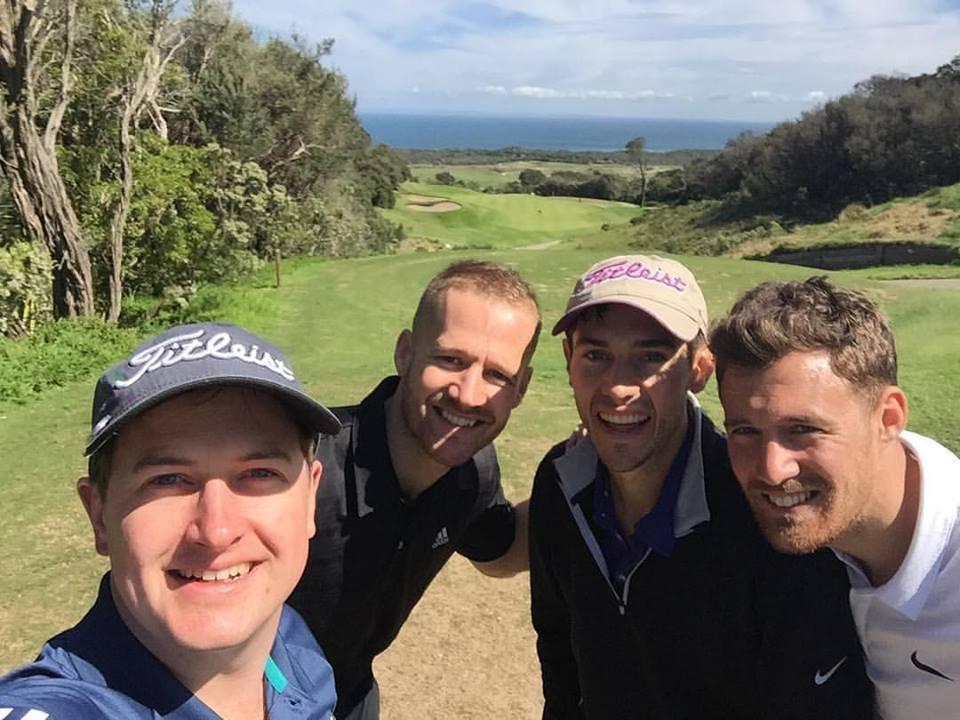 Jonathan (left) with his golf buddies having a good time on the course
